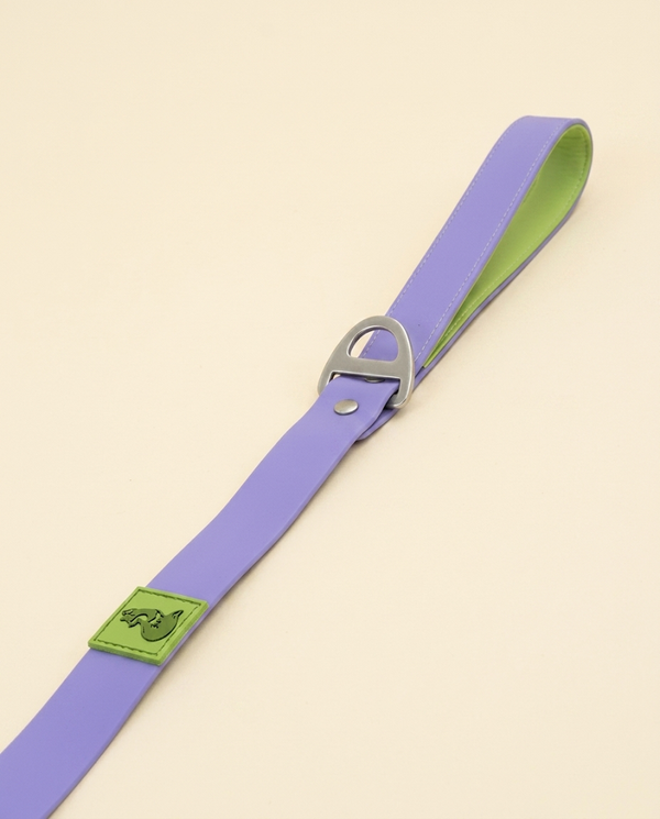 Lavender purple waterproof dog leash close-up showing silver D-ring buckle and lime-green inner handle accent